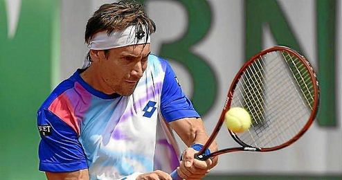 David Ferrer golpea la bola en el duelo ante Seppi. David Ferrer golpea la bola en el duelo ante Seppi.