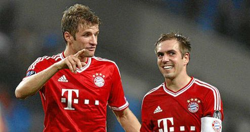Müller y Lahm durante un partido con su equipo en esta temporada Müller y Lahm durante un partido con su equipo en esta temporada