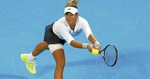 Garbiñe, en un lance de un partido en el Abierto de Pekín. Garbiñe, en un lance de un partido en el Abierto de Pekín.