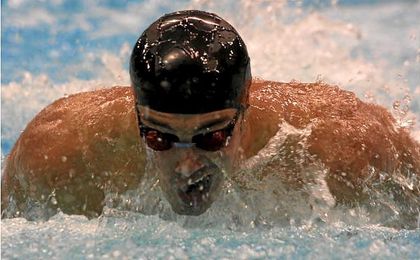 Rafa Muñoz logró ser plusmarquista mundial de los 50 metros mariposa. Rafa Muñoz logró ser plusmarquista mundial de los 50 metros mariposa.