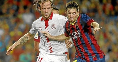 Rakitic, en un lance con Messi del Barcelona-Sevilla. Rakitic, en un lance con Messi del Barcelona-Sevilla.