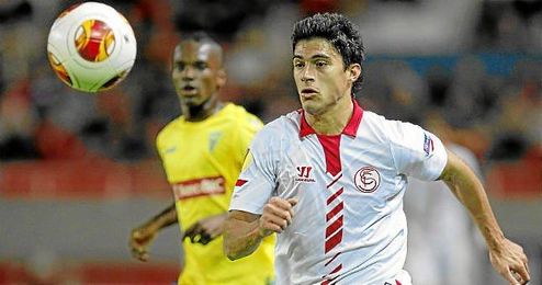 Diego Perotti, en el partido del Sevilla frente al Estoril. Diego Perotti, en el partido del Sevilla frente al Estoril.