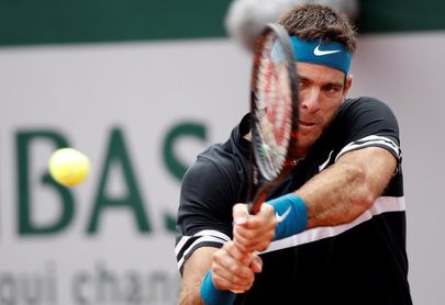 Del Potro golpea de revés durante su partido ante Marin Cilic. Del Potro golpea de revés durante su partido ante Marin Cilic.