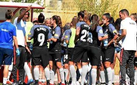 Paco García y Sergio Jiménez, en un partido con el Sevilla FC Femenino. Paco García y Sergio Jiménez, en un partido con el Sevilla FC Femenino.