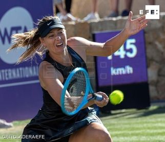 Sharapova regresa tras su lesión y vence a la eslovaca Kuzmova en Mallorca Sharapova regresa tras su lesión y vence a la eslovaca Kuzmova en Mallorca