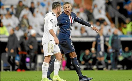 Carvajal y Mbappé, durante el Madrid-PSG de fase de grupos de la UCL. Carvajal y Mbappé, durante el Madrid-PSG de fase de grupos de la UCL.